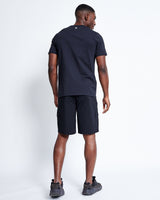 Black utility shorts shown from back with cargo pocket panels