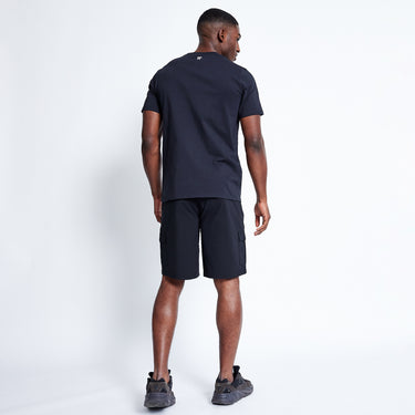 Black utility shorts shown from back with cargo pocket panels