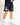 Black sweat shorts with graphic side label and Eleven Degrees logo on leg