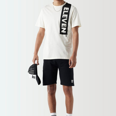 Coconut white T-shirt with vertical black logo block lettering on the front