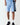 Light blue sweat shorts with elastic waistband and black ELEVEN logo side tape