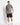 Black woven cargo shorts with belt loops, front cargo pocket, and small leg logo