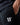 Black jogger fabric close-up with 11° logo printed on the leg