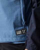 Jacket hem label reading 'ELEVEN DEGREES' and '11°' mark