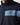 Navy full-zip sweat top close-up of light blue chest stripe with logo