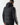 Black puffer jacket with hood and vertical taped sleeve stripe