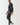 Black full-zip hoodie with hood and front zipper, side profile view