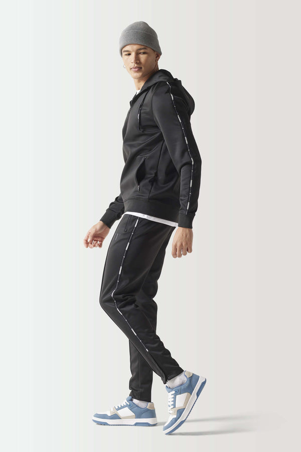Black full-zip hoodie with hood and front zipper, side profile view