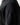 Black premium sweatshirt sleeve close-up with small textured logo