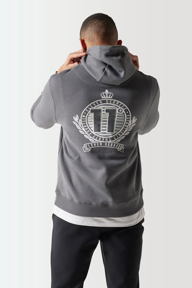 Slate grey men's hoodie with oversized back crest logo and hood