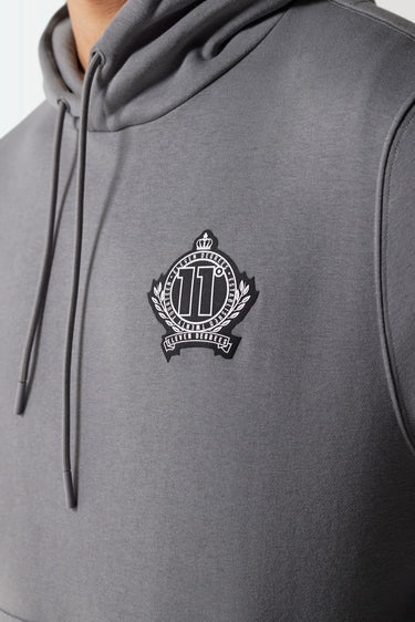 Slate grey men's hoodie with small chest crest logo and drawstring cords