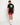 Red junior swim shorts with elastic waistband, front seam, and small black 11° logo