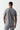 Back view of model wearing grey Core T-Shirt 