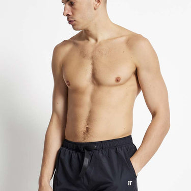 Black belted swim shorts with elastic waistband and side logo detail