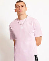 Light pink T-shirt with small '11' print on chest and square logo tag at side